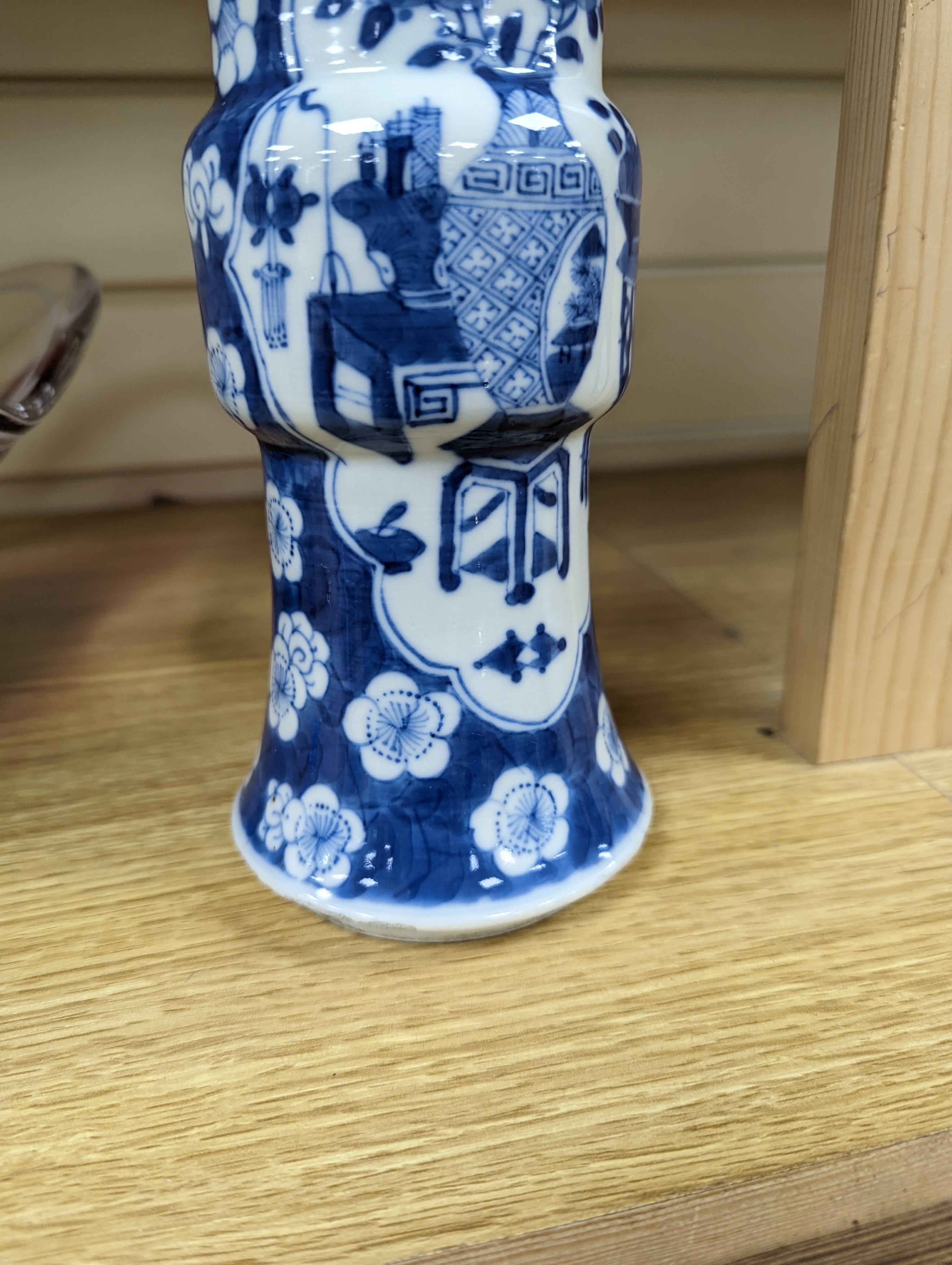 A 19th century Chinese blue and white prunus gu vase, 25 cms high.